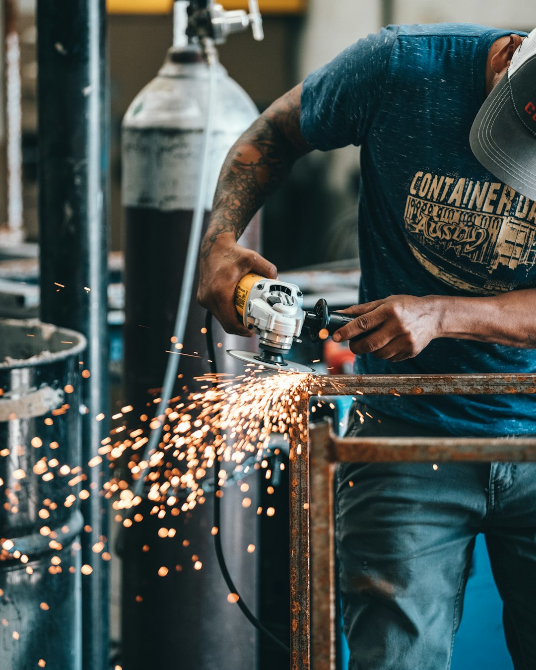 about-02 man-using-angle-grinder-yemsw57gya8